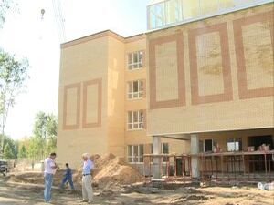 Менее чем за год было возведено четырехэтажное здание…